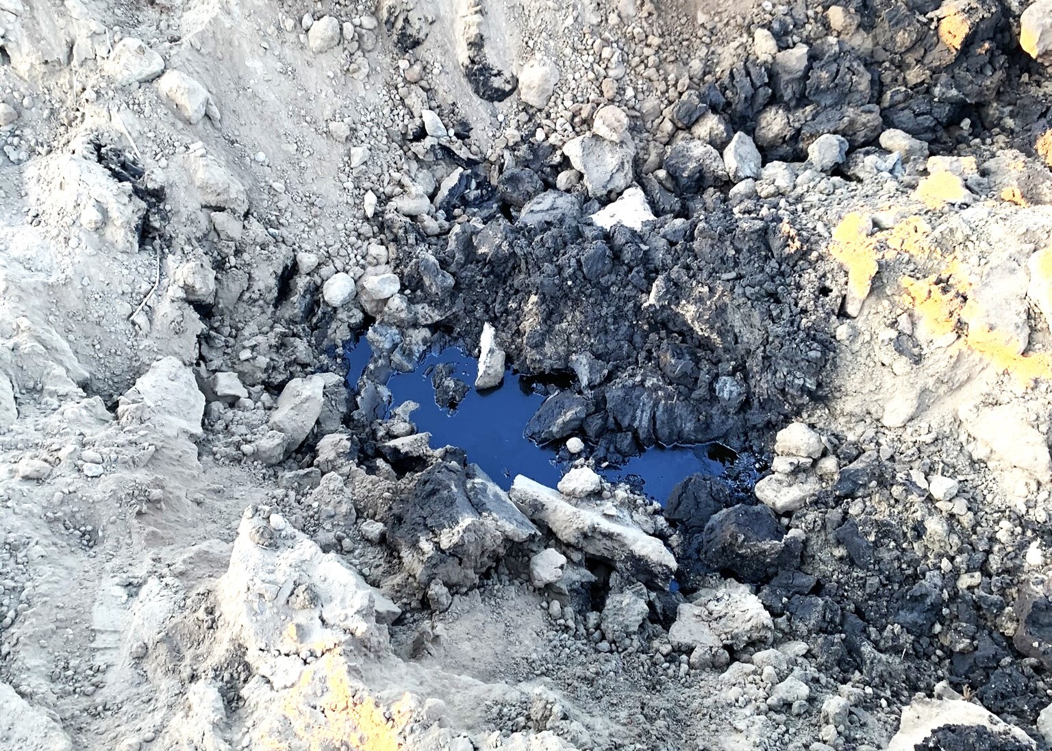 Oil-contaminated soil at an industrial site